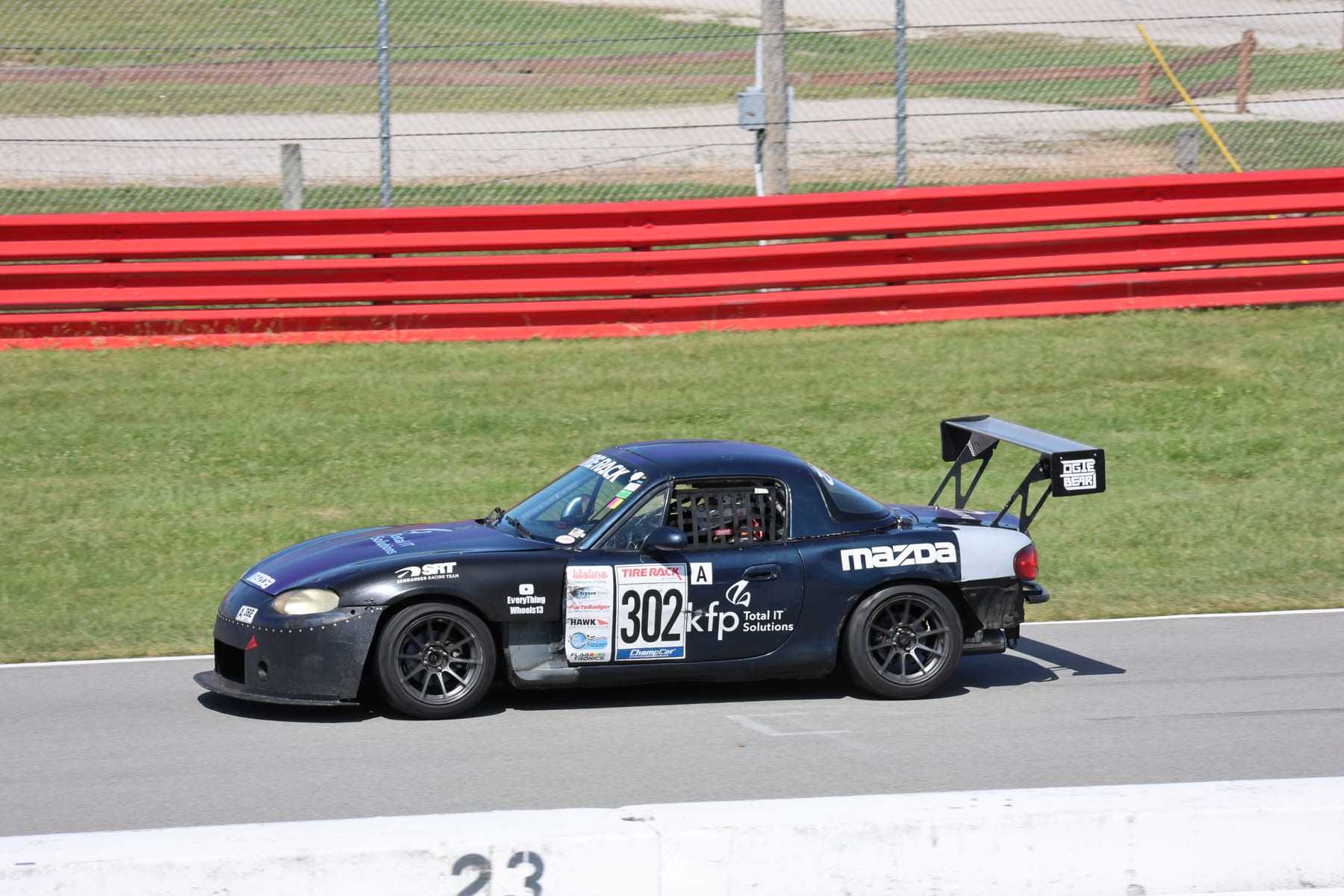 Senhauser Racing #302 Mazda Miata on track at Mid-Ohio Sports Car Course